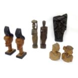 A quantity of assorted tribal items to include figural busts, carved figures, etc. Please Note -