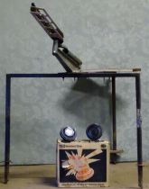 Clay pigeon shooting : a late 20thC Bowman double trap, affixed to a stand with seat, approx 64"