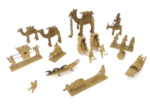 A quantity of assorted carved wooden figures, animals, etc. to include graduated camels, water