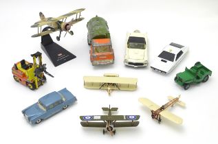 Toys: A quantity of assorted scale model planes and vehicles, comprising four Corgi biplanes,