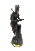 A late 19th / early 20thC French bronze figure modelled as a young woman / nymph playing a musical