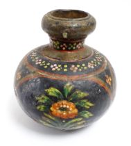 An Indian toleware vase with hand painted decoration depicting flowers and foliage. Approx. 5 1/4"