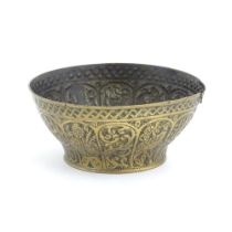 An Islamic brass bowl with embossed and engraved decoration depicting figures with weapons / arms,