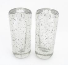 Two mid century studio glass vases of clear glass with bubble detail. Approx. 10" high (2) Please