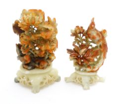 Two Chinese soapstone carvings, one depicting an exotic pheasant in a tree, the other with birds and