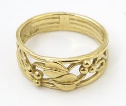 A 9ct gold ring with Art Nouveau style honesty leaf scroll detail. Ring size approx. N Please Note -