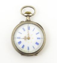 A Continental silver fob watch with white enamel dial and blue enamel numerals . The case with