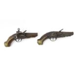 Militaria: a pair of 18thC continental miquelet flintlock belt pistols, each having 4 1/8" banded