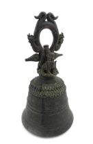 A Burmese cast bronze temple bell with banded stylised petal detail to the shoulder, the finial