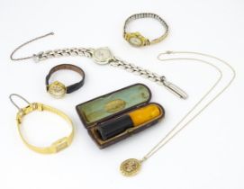 Assorted items to include four ladies wrist watches, a gilt metal locket and chain, and a cigar /