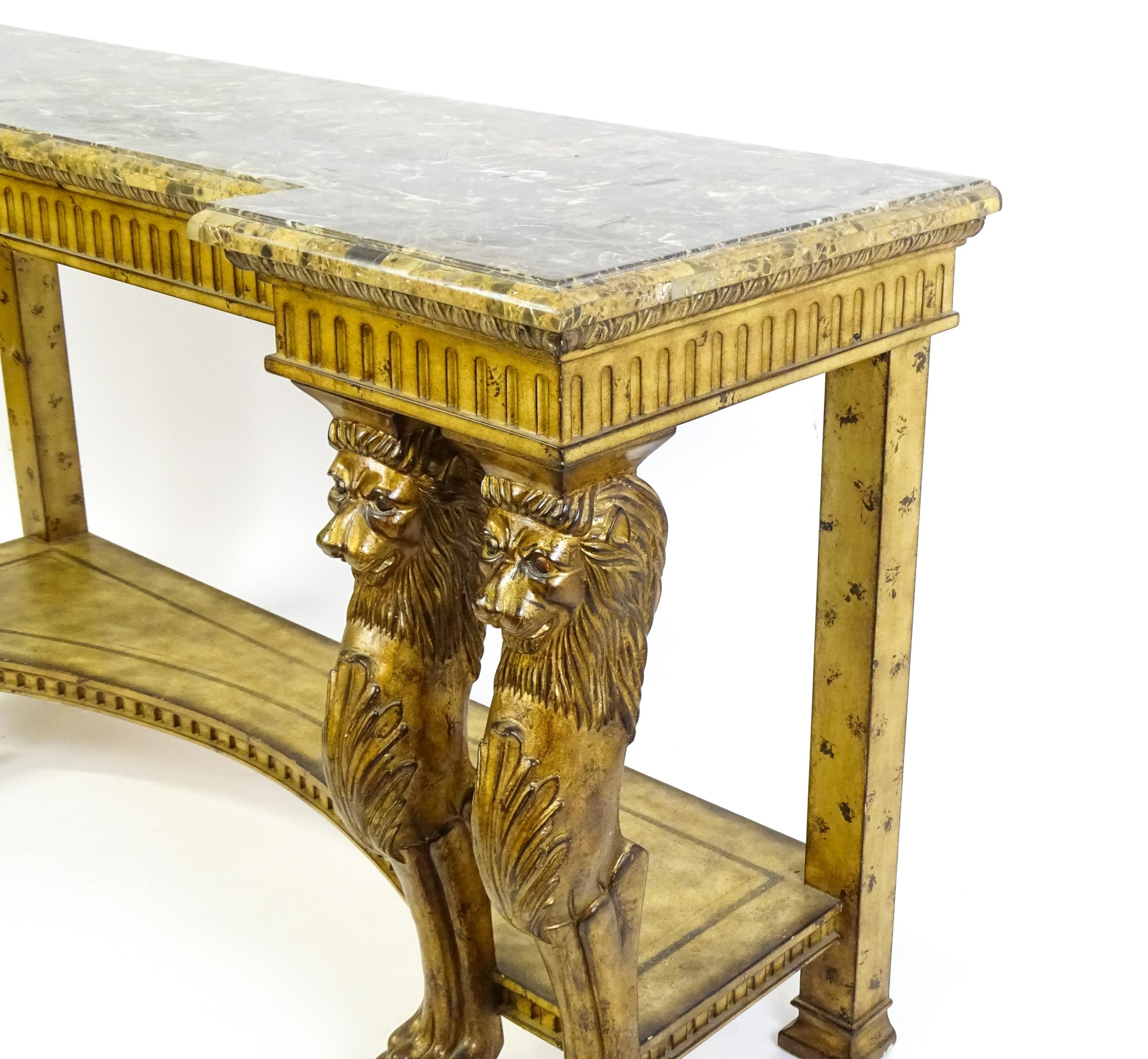 A late 20thC marble and wooden topped inverted break front console table with two pairs of lion - Image 6 of 10