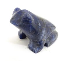 A carved lapis lazuli model of a frog. Approx. 1" high Please Note - we do not make reference to the