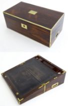 A 19thC brass bound rosewood writing box / slope with twin campaign style handles, single drawer