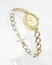 A ladies 9ct gold cased wristwatch the dial signed Sovereign, with a 9ct gold bracelet strap.