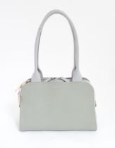 A grey Radley Millbank leather handbag with original dust bag. Width approx. 13" Please Note - we do