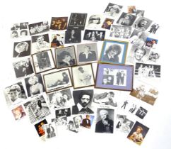 A quantity of framed signed photographs of mid to late 20thC entertainers and artists,