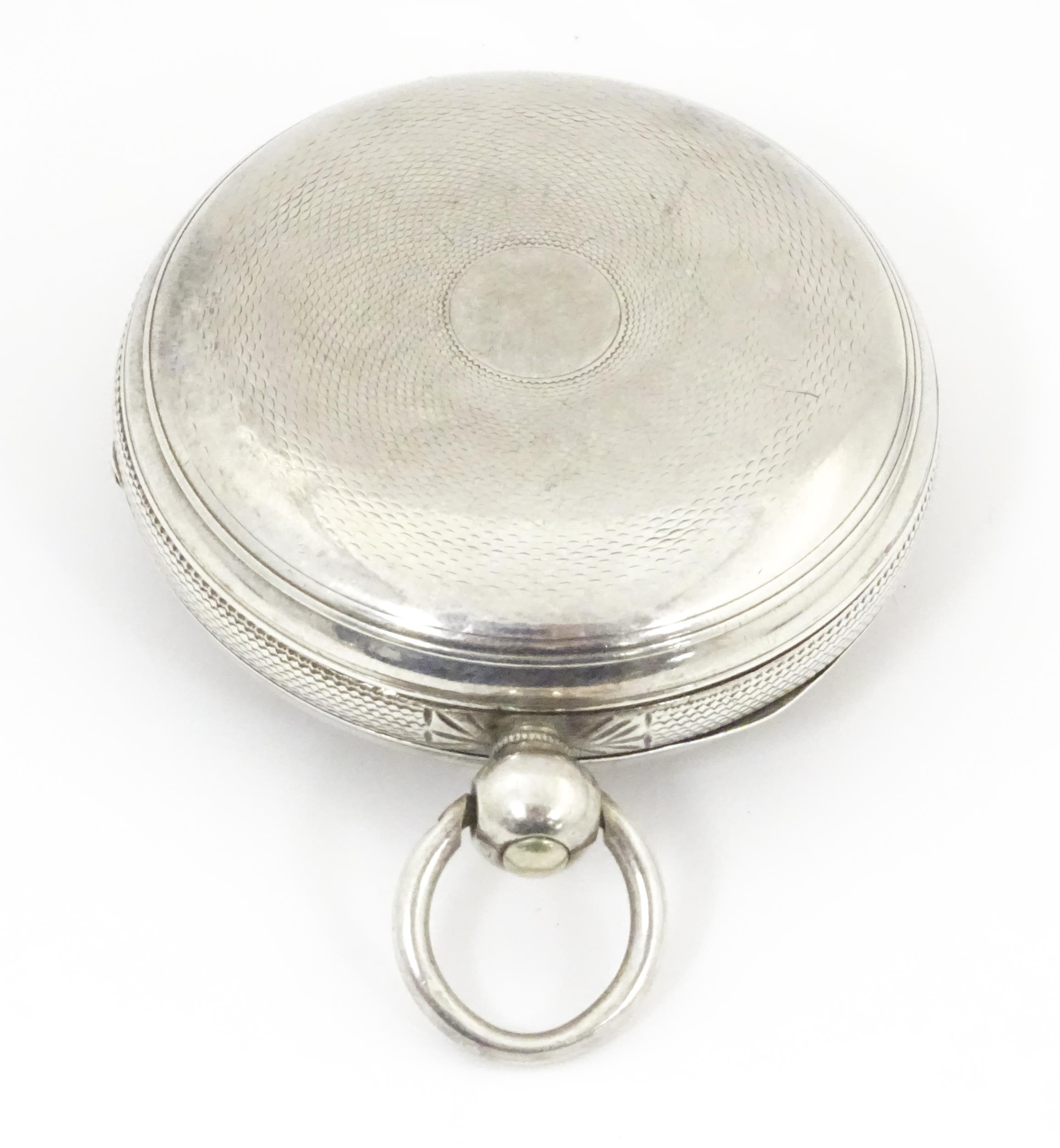 A Victorian silver cased pocket watch. The case hallmarked London 1847 maker William Carter. The key - Image 2 of 8