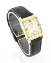 A vintage Elgin Deluxe 10k gold filled gentlemans wristwatch with squared dial and subsidiary