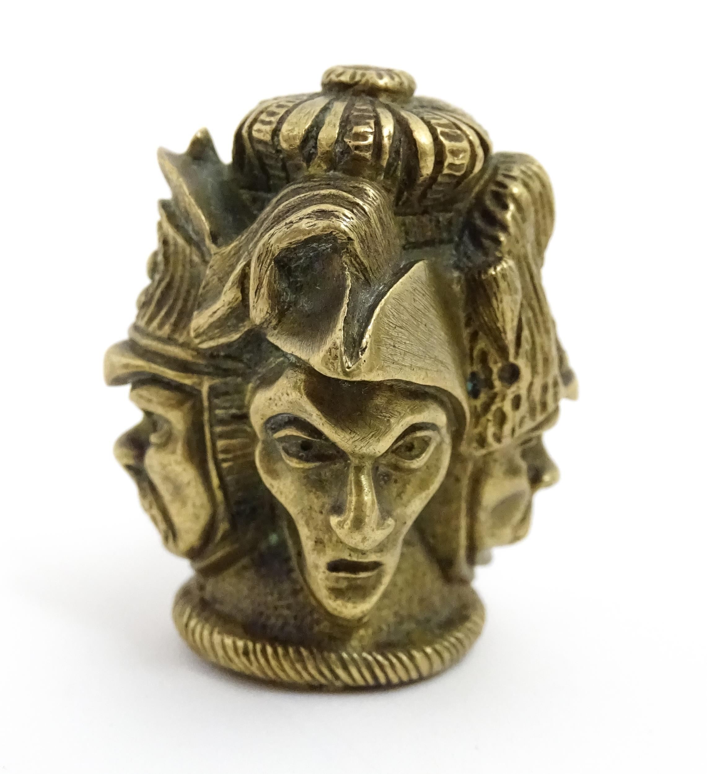 A 20thC cast brass cane top with multi face detail depicting four military figures. Approx. 1 3/4" - Image 5 of 7