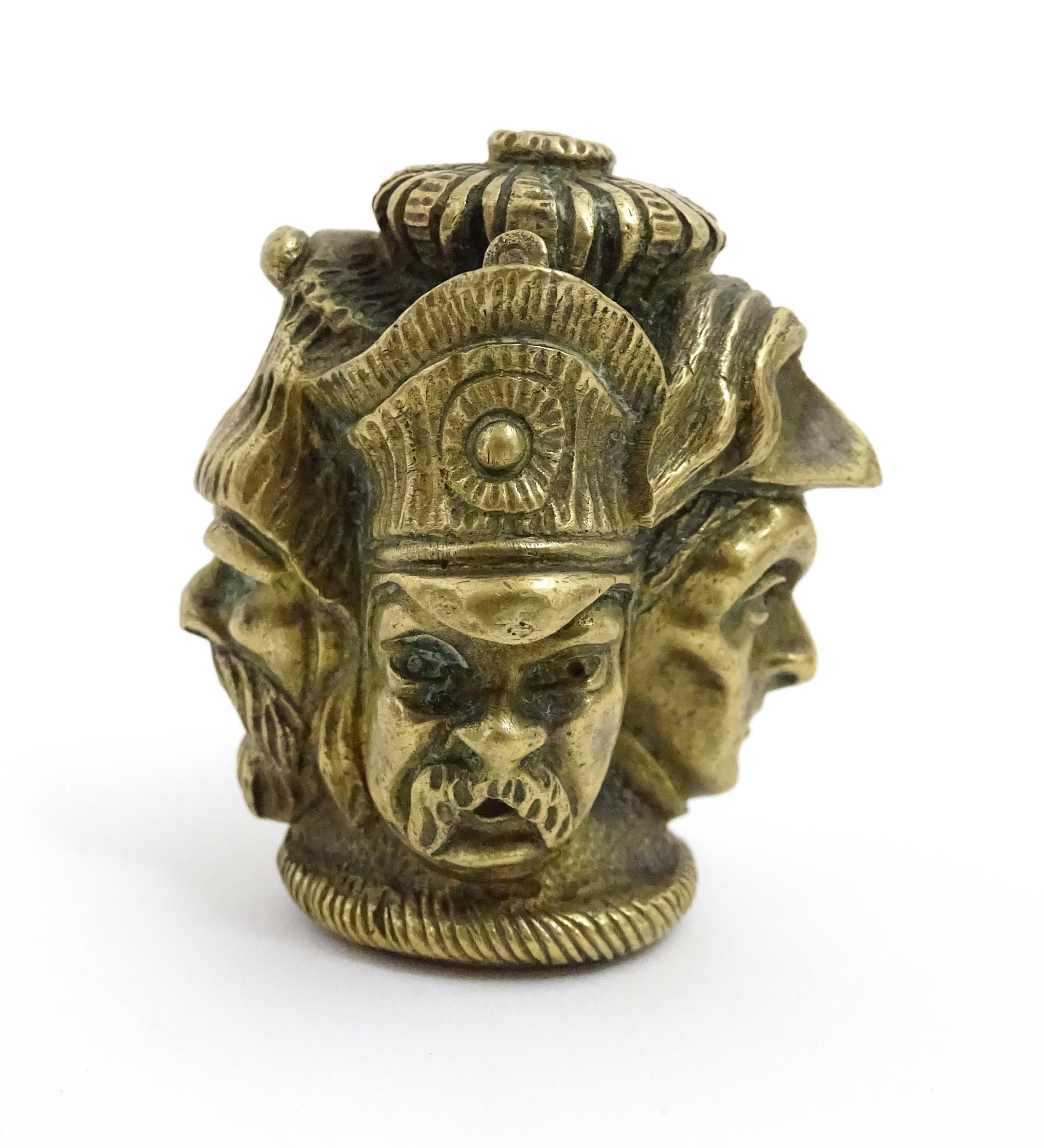 A 20thC cast brass cane top with multi face detail depicting four military figures. Approx. 1 3/4" - Image 4 of 7