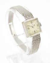 A ladies 9k white gold Tudor manual winding wristwatch with 9k gold bracelet. Watch case approx. 1/