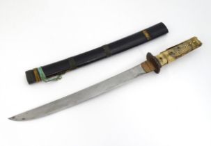 A Japanese Tanto short sword, approx 20" long Please Note - we do not make reference to the