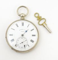 A white metal cased pocket watch with Swiss key wind movement by Gindrat & Cie Geneve. The white