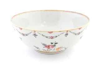 A Chinese famille rose bowl decorated with floral garlands and flower motifs. Approx. 4 1/4" high