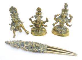 Four Indian brass items to include three models of deities to include Ganesh, Lakshmi, Bal