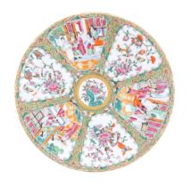 A Chinese / Cantonese famille rose plate / charger with panel decoration depicting interior scenes