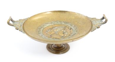 A 19thC French bronze twin handled tazza depicting a relief profile portrait of Juno titled JVNON,