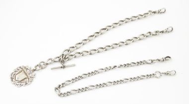 Two silver pocket watch chains, one with a Victorian silver fob. Please Note - we do not make