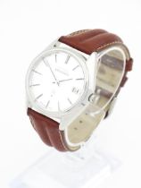 A Seiko King Quartz steel cased gentlemens wristwatch. Watch case approx. 1 3/8" wide Please