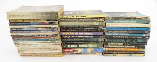 Books: a quantity of mid to late 20thC Science Fiction paperbacks, comprising: Of Time and Stars