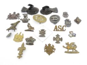 A quantity of assorted military insignia and heraldic / livery badges etc, to include a WWI Army