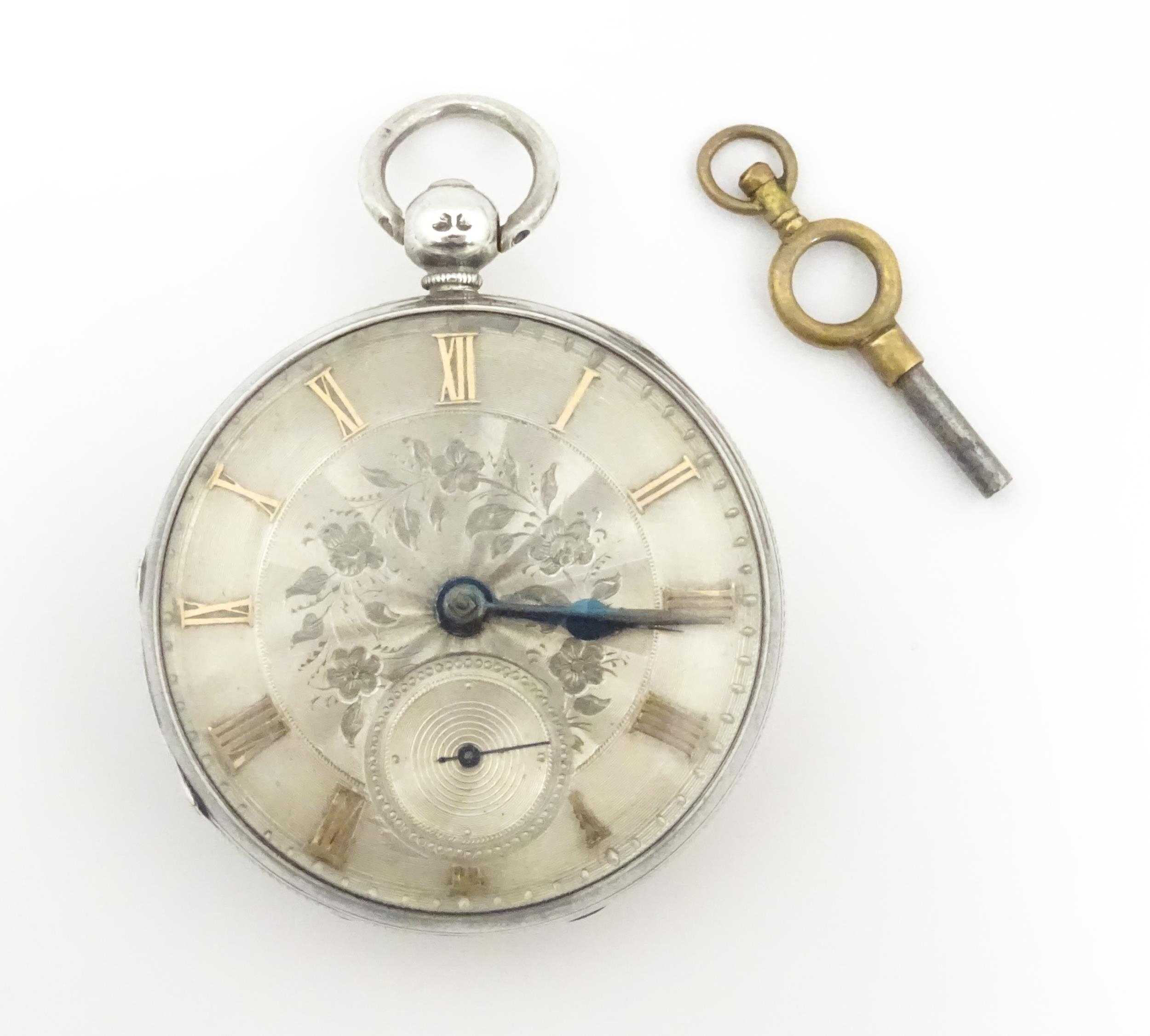 A Victorian silver cased pocket watch. The case hallmarked London 1847 maker William Carter. The key - Image 3 of 8