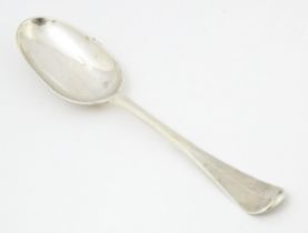 A Geo II Hanoverian silver table spoon with rats tail bowl hallmarked London 1735, maker William