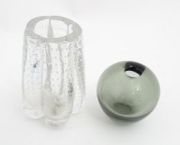 A Whitefriars clear glass controlled bubble vase together with a Holmegaard smoky glass Rondo vase