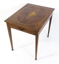 A late 18thC / early 19thC mahogany side table with a marquetry inlaid top, having crossbanding