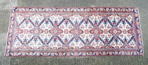 Carpet / Rug : A Persian Ardebil runner, the cream ground with floral and geometric repeating detail