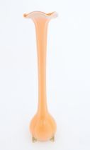 A tall Empoli orange glass vase. Approx. 20" high Please Note - we do not make reference to the