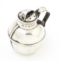 A Victorian silver pepper modelled as a Guernsey cream pot, hallmarked Birmingham 1898, maker