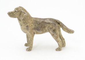 A silver model of a Labrador dog hallmarked London 1998. Approx. 2" long Please Note - we do not
