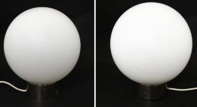 A pair of retro / mid century table lamps of spherical form. In the style of Glashutte Limburg.