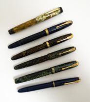 Five Parker Canada fountain pens, comprising a Duofold with 18ct gold nib, a Duofold with 14K gold