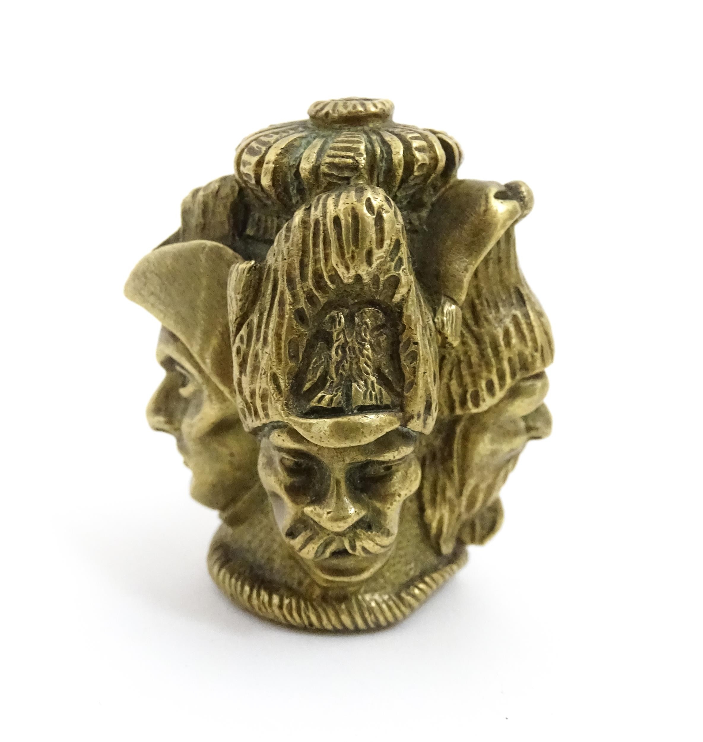 A 20thC cast brass cane top with multi face detail depicting four military figures. Approx. 1 3/4" - Image 6 of 7