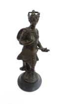 A late 19th / early 20thC cast bronze figure modelled as a crowned warrior. Approx. 11" high