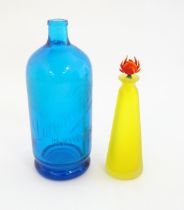 An art glass scent bottle of conical form with yellow, orange and blue detail. Together with a