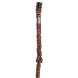 Walking Stick. A Victorian folk art wooden walking stick