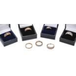 Rings. A modern 9ct gold three-tone ring set with diamond chippings, size R, 3.9g